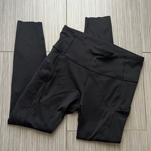 Lululemon leggings in black with side pockets.